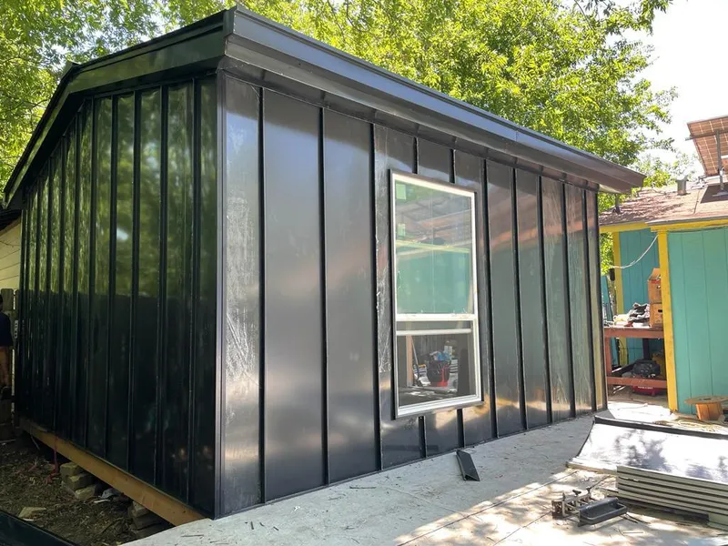 Black standing seam metal wall panels for Roof Inspection in Golden Hills