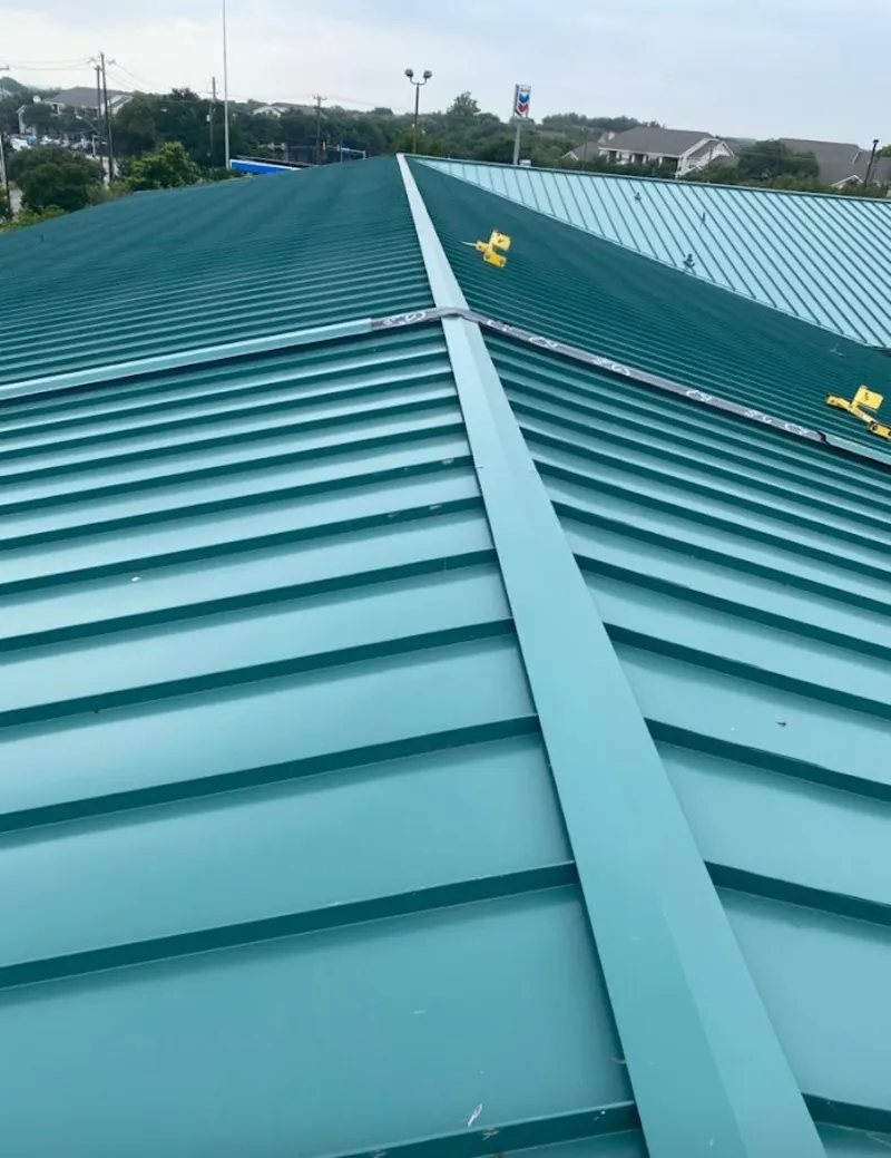 Green commercial metal roof ridge and valley for Metal Roof Repair in Golden Hills